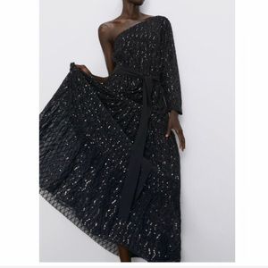 Asymmetric sequin dress